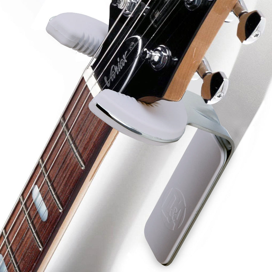 Guitar grip outlet wall hanger